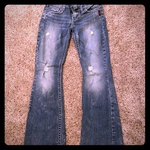Silver distressed flared jeans